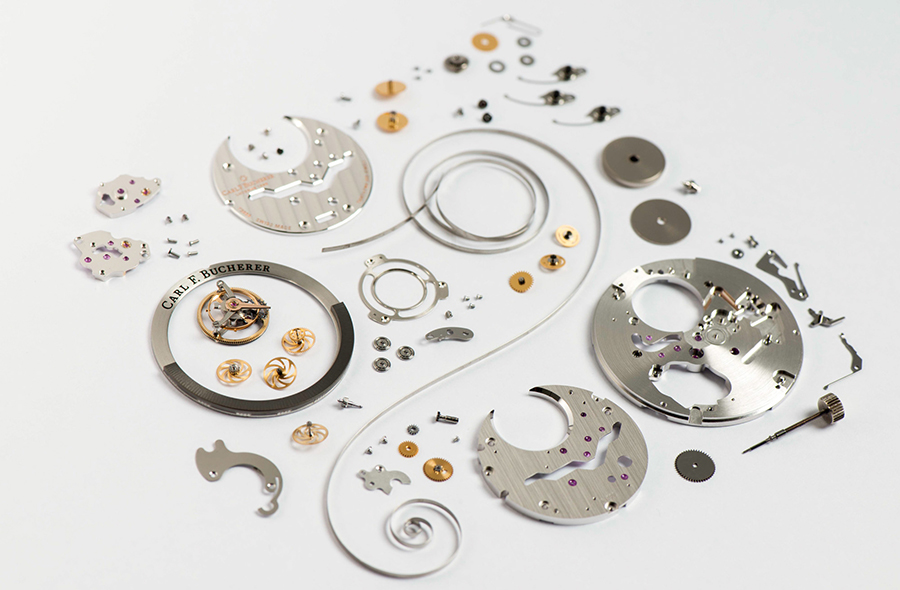 Disassembled components of a mechanical watch movement